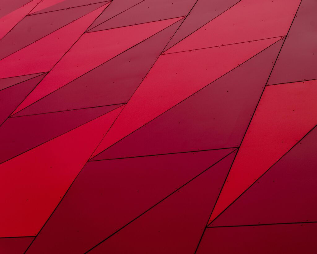 An abstract geometric pattern with red triangles, perfect for modern design needs.